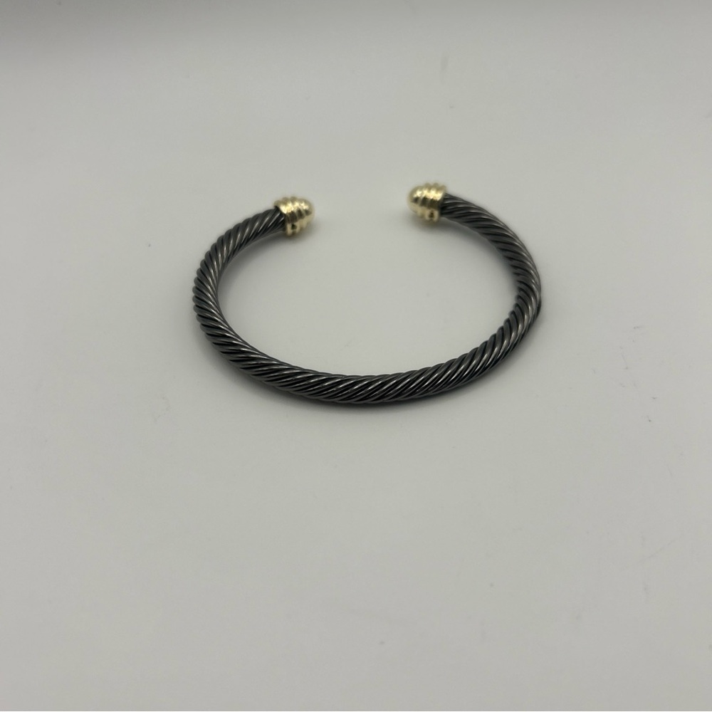Elegant Black and Gold Twisted Bracelet